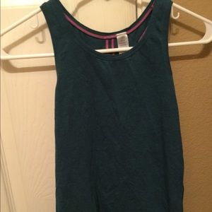 A dark blue Ivivva exercise shirt(worn once)
